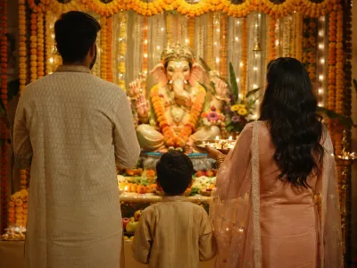 Family gathered for final aarti before Ganesh Visarjan at home