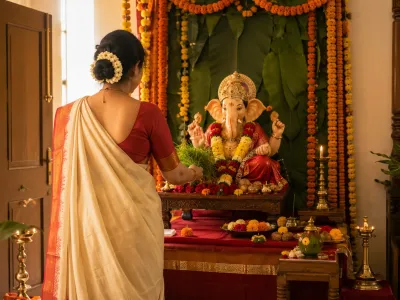 Family preparing Vastu-aligned Ganpati sthapana at home for Ganesh Chaturthi